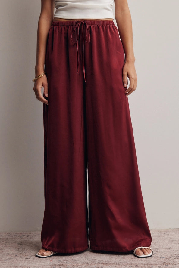 Burgundy satin flowy pants with an adjustable ankle scrunch – Lavish 31