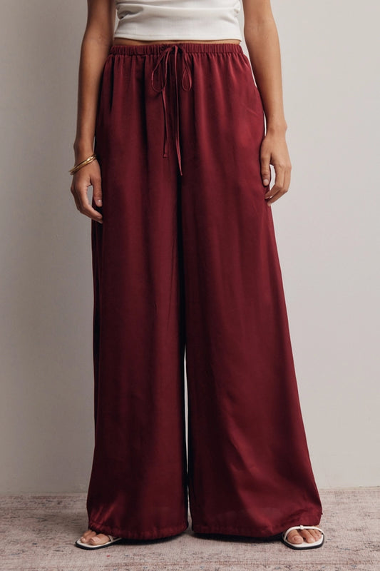 Burgundy satin flowy pants with an adjustable ankle scrunch – Lavish 31